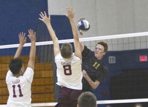 Alhambra middle Christian Cota fires off a shot in the Bulldogs' 3-2 loss to the Las Lomas Knights on April 14, 2016. (MARK FIERNER / Martinez Tribune)