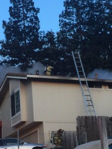 Fire crews work to extinguish a fire at a home in the 200 block of Midway Drive in Martinez on Tuesday evening, May 17, 2016. (ConFire / Courtesy)