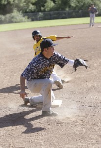 Alhambra junior third baseman Tom Peon del Valle awaits a throw at third base as the Spartans’ player bears down on the base in the 2-1 loss for Alhambra on May 9, 2016. (MARK FIERNER / Martinez Tribune)
