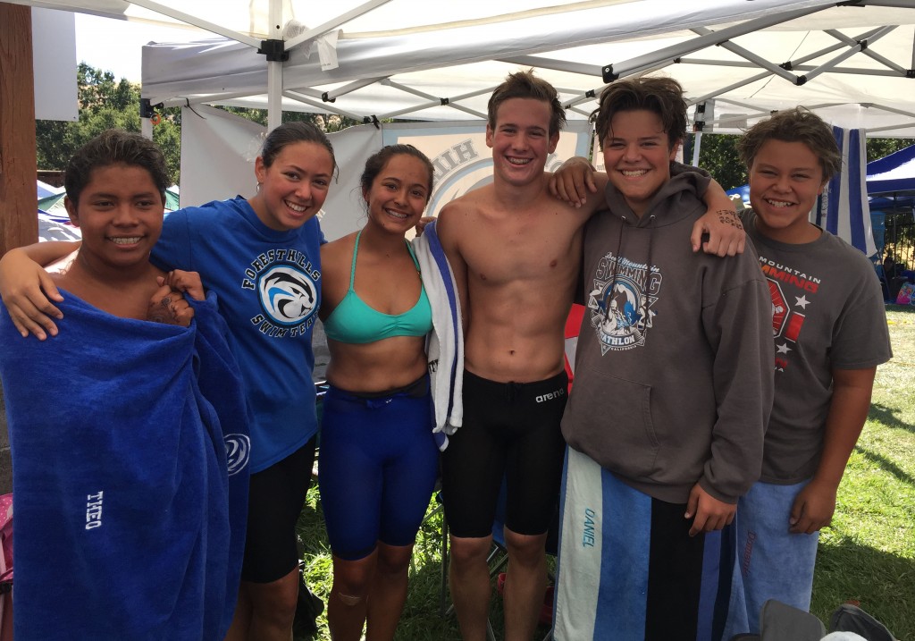 Theo Wakeman, Laura Garfein, Briona Robinett, Alex Halfon, Matthew Rico, Jonathan Rico smile after a long day of swimming. (COURTESY / On File)
